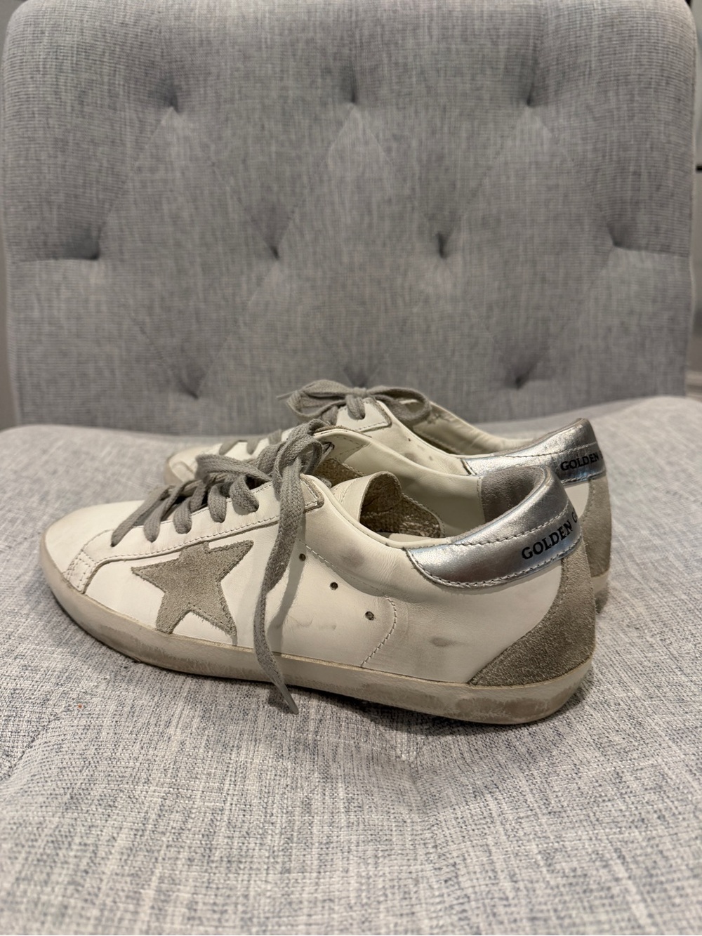 Golden Goose Super-Star trainers with silver heel tab and metal stud lettering
